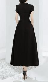 Andrea cut out a-line midi dress in black