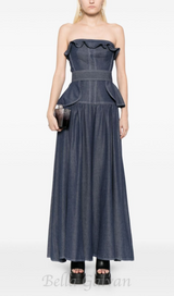 SIGRID PEPLUM-WAIST DENIM JUMPSUIT IN NAVY BLUE