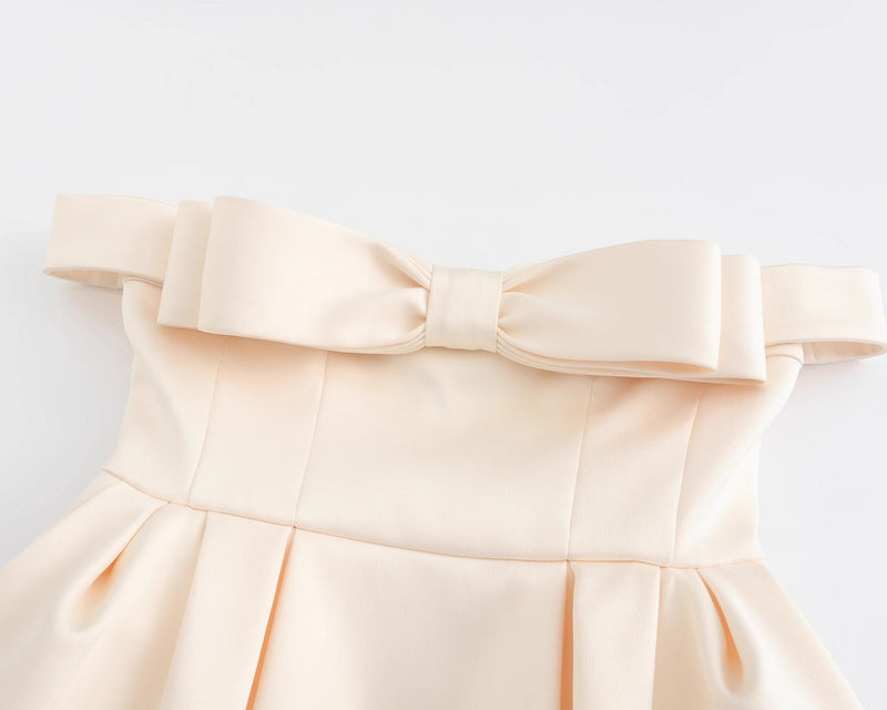 bow mini dress in beige